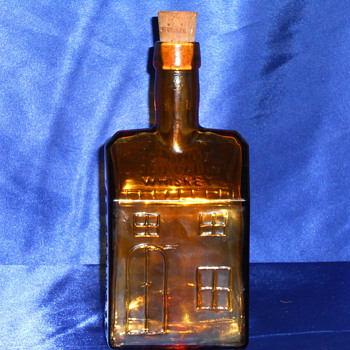 E.C Or E.G BOOZ'S OLD CABIN WHISKEY