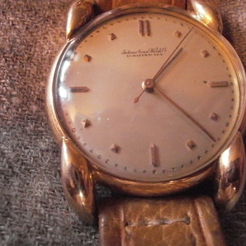 Father's antique IWC 18 karat gold watch