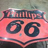 Phillips 66 dated 1956,Coca Cola bottle rack,Dupont antifreeze cardboard from 1920's,Candy machine from 40's