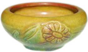 Small bowl with incised and painted decoration of dandelions going all around, the work of Charles Stewart Todd in 1913 Small bowl with incised and painted decoration of dandelions going all around, the work of Charles Stewart Todd in 1913