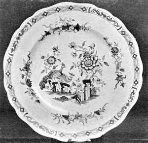 A Chamberlain Worcester Plate: Here the decoration for a large dinner service, of which this is one plate, includes both Chelsea birds and lotus flowers from the Imari patterns. Done in full colors, it was made circa 1825 and bears the impressed mark “Chamberlains’ Worcester.” - courtesy American Art Association-Anderson A Galleries A Chamberlain Worcester Plate: Here the decoration for a large dinner service, of which this is one plate, includes both Chelsea birds and lotus flowers from the Imari patterns. Done in full colors, it was made circa 1825 and bears the impressed mark “Chamberlains’ Worcester.” - courtesy American Art Association-Anderson A Galleries