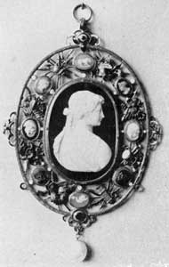 18th-Century English Pendant: The openwork frame for this cameo profile head is of gold set with smaller cameos, precious stones, and a large pearl finial. Such a piece of jewelry might have been imported, but it was probably too elaborate and expensive for the American taste 18th-Century English Pendant: The openwork frame for this cameo profile head is of gold set with smaller cameos, precious stones, and a large pearl finial. Such a piece of jewelry might have been imported, but it was probably too elaborate and expensive for the American taste