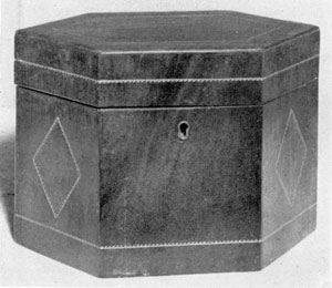 A Darlington Tea Caddy: This piece, made of mahogany, in the Hepplewhite manner with delicate geometric inlay designs, was the work of Amos Darlington, Jr. A Darlington Tea Caddy: This piece, made of mahogany, in the Hepplewhite manner with delicate geometric inlay designs, was the work of Amos Darlington, Jr.