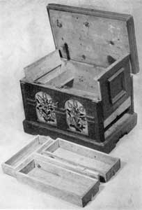 ILLUSTRATION V: A Pennsylvania Painted Chest: The right end, that is movable, has been raised to show the drawers concealed in the false bottom. These are arranged as they fit into the space in front of this miniature chest. ILLUSTRATION V: A Pennsylvania Painted Chest: The right end, that is movable, has been raised to show the drawers concealed in the false bottom. These are arranged as they fit into the space in front of this miniature chest.