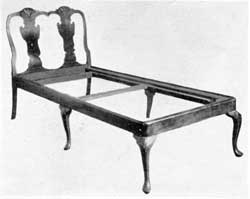 A Queen Anne Day Bed: The double splat of the back, shell carvings on the knees of legs, and cresting of the top, are characteristic details with the elaborate work of the period. Of Philadelphia origin, it was made of mahogany. A Queen Anne Day Bed: The double splat of the back, shell carvings on the knees of legs, and cresting of the top, are characteristic details with the elaborate work of the period. Of Philadelphia origin, it was made of mahogany.