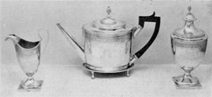 A Revere Tea Set in Adam Style: These pieces were presented to Edmund Hartt, constructor of the frigate Boston. The sugar bowl bears the presentation inscription and the others his monogram. A Revere Tea Set in Adam Style: These pieces were presented to Edmund Hartt, constructor of the frigate Boston. The sugar bowl bears the presentation inscription and the others his monogram.