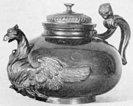 Illustration III: Boettger Porcelain Teapot: Copied from a silver model by Irminger, it was made circa 1712 and is unmarked. This piece was carefully polished. It is seven inches in width. Illustration III: Boettger Porcelain Teapot: Copied from a silver model by Irminger, it was made circa 1712 and is unmarked. This piece was carefully polished. It is seven inches in width.