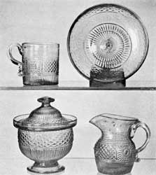 Choice Blown Molded Glass: In the upper row are a handled mug with the scarce waffle sunburst pattern and dish in the diamond sunburst design. Below are, left, sugar bowl with cover in perfect condition and, right, a cream pitcher of the rare sunburst with bulls-eye center pattern. Choice Blown Molded Glass: In the upper row are a handled mug with the scarce waffle sunburst pattern and dish in the diamond sunburst design. Below are, left, sugar bowl with cover in perfect condition and, right, a cream pitcher of the rare sunburst with bulls-eye center pattern.