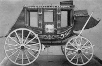 Concord Coach Model: This is a scale model of the coaches made for Wells Fargo & Co. by Abbott, Downing & Co. of Concord, New Hampshire. The decorative painting of this model was done by Edwin Burgum who, with his father, did the painting of the original Concord coaches that were shipped by sailing ships around Cape Horn for use on the Wells Fargo stagecoach lines in California. In design and coloring, the painting is the same as was used on these original coaches. Concord Coach Model: This is a scale model of the coaches made for Wells Fargo & Co. by Abbott, Downing & Co. of Concord, New Hampshire. The decorative painting of this model was done by Edwin Burgum who, with his father, did the painting of the original Concord coaches that were shipped by sailing ships around Cape Horn for use on the Wells Fargo stagecoach lines in California. In design and coloring, the painting is the same as was used on these original coaches.