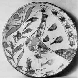An Early Pinprick Decoration: This plate, dated circa 1793, is attributed to Henry Roudebuth, whose pottery was in Montgomery County, Pennsylvania. An Early Pinprick Decoration: This plate, dated circa 1793, is attributed to Henry Roudebuth, whose pottery was in Montgomery County, Pennsylvania.