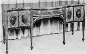 English sideboard with effective use of satinwood inlay and banding, contrasting with crotch mahogany veneer. English sideboard with effective use of satinwood inlay and banding, contrasting with crotch mahogany veneer.