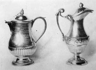 Illustration V: Ewers by Laurent Amiot of Quebec: Used as CHOCOLATIERES or AIGUIERES, that at the left bears a lengthy inscription stating that it was given as a tribute of gratitude to the people of Isle-aux-Coudres after the salvage in 1832 of the brig ROSALIND. Illustration V: Ewers by Laurent Amiot of Quebec: Used as CHOCOLATIERES or AIGUIERES, that at the left bears a lengthy inscription stating that it was given as a tribute of gratitude to the people of Isle-aux-Coudres after the salvage in 1832 of the brig ROSALIND.