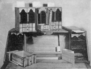 ILLUSTRATION IV: Fifteen Secret Places: This is the interior of the New England Queen Anne desk illustrated on the cover. The central section has been removed to show the pocket concealed at the back. In the foreground are two of the secret drawers. At the back can be seen an additional document box that slides behind the pigeonholes on that side. Beneath the central section can be seen the well that occupies the space of the large false drawer. Access is through the sliding panel built into the writing surface, which has been pushed back. ILLUSTRATION IV: Fifteen Secret Places: This is the interior of the New England Queen Anne desk illustrated on the cover. The central section has been removed to show the pocket concealed at the back. In the foreground are two of the secret drawers. At the back can be seen an additional document box that slides behind the pigeonholes on that side. Beneath the central section can be seen the well that occupies the space of the large false drawer. Access is through the sliding panel built into the writing surface, which has been pushed back.