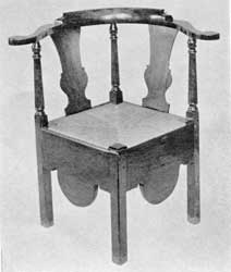 Illustration VI: Of maple in Queen Anne style, circa 1720-1740. The front cabriole leg terminating in a Dutch foot and turned diagonal stretchers are the outstanding features of this chair. Illustration VI: Of maple in Queen Anne style, circa 1720-1740. The front cabriole leg terminating in a Dutch foot and turned diagonal stretchers are the outstanding features of this chair.