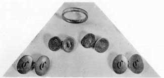 Jewelry from the Van Cortlandt Family: At the top, a gold and enameled mourning ring inscribed: "In memory of Capt. Rich. Burton who died 1 Oct., 1784. Aged 26"; center, pair of gold cuff links engraved with cypher of Governor George Clinton with mark of Andrew Billings, Poughkeepsie, N. Y., working 1784-1810; below, gold cuff links owned by Governor De Witt Clinton initialed with Old English C in black enamel. Jewelry from the Van Cortlandt Family: At the top, a gold and enameled mourning ring inscribed: "In memory of Capt. Rich. Burton who died 1 Oct., 1784. Aged 26"; center, pair of gold cuff links engraved with cypher of Governor George Clinton with mark of Andrew Billings, Poughkeepsie, N. Y., working 1784-1810; below, gold cuff links owned by Governor De Witt Clinton initialed with Old English C in black enamel.