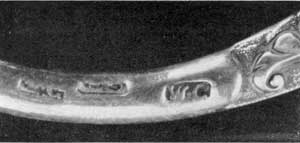 Mark of William Cario: These are the initials WC in clipped rectangle. This mark is from the Peirce sword. Two imperfect impressions of the same mark can be seen at the left. Mark of William Cario: These are the initials WC in clipped rectangle. This mark is from the Peirce sword. Two imperfect impressions of the same mark can be seen at the left.
