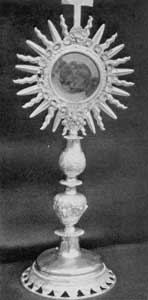 Illustration IV: By Michel Coton: This monstrance at the church of Sainte Famille, Island of Orleans, was made by this Quebec silversmith about 1700. Illustration IV: By Michel Coton: This monstrance at the church of Sainte Famille, Island of Orleans, was made by this Quebec silversmith about 1700.