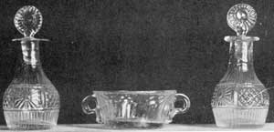 Illustration II: Miniature Decanters and Salt Dish: The decanters have their original stoppers, which is unusual, and range from one and one-quarter to two and one-half inches in height. The salt dish is a unique specimen. Illustration II: Miniature Decanters and Salt Dish: The decanters have their original stoppers, which is unusual, and range from one and one-quarter to two and one-half inches in height. The salt dish is a unique specimen.