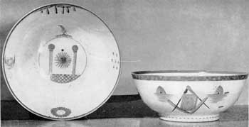 Pair of Lafayette Punch Bowls: Of Oriental Lowestoft, these were used in 1824 when General Lafayette was made a member of the Columbian Commandery of the Knights Templars of New York City. Decoration in gold and enameled colors; Figure 12: interior of bowl showing pair of Columns and Sun; Figure 13: Exterior showing Square, Compass, Bible, and pair of Beehives. Pair of Lafayette Punch Bowls: Of Oriental Lowestoft, these were used in 1824 when General Lafayette was made a member of the Columbian Commandery of the Knights Templars of New York City. Decoration in gold and enameled colors; Figure 12: interior of bowl showing pair of Columns and Sun; Figure 13: Exterior showing Square, Compass, Bible, and pair of Beehives.