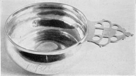 Porringer by Paul Revere I: He was apprenticed to John Coney. The handle of this piece is typical in shape and design of those used by New England silversmiths of the period. Porringer by Paul Revere I: He was apprenticed to John Coney. The handle of this piece is typical in shape and design of those used by New England silversmiths of the period.