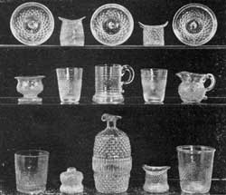 Illustration II: Rarities in Blown-Molded Glass: Outstanding are the three small sauce plates in the top row; the two miniature flip glasses and the mug with handle in the center row; and two tumblers and the ink well in the bottom row. Illustration II: Rarities in Blown-Molded Glass: Outstanding are the three small sauce plates in the top row; the two miniature flip glasses and the mug with handle in the center row; and two tumblers and the ink well in the bottom row.
