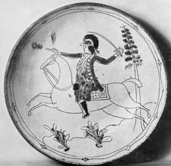 The Soldier on Horseback Design: This sgraffito and slip decorated plate was made circa 1800 by David Spinner in Bucks County, Pennsylvania. The Soldier on Horseback Design: This sgraffito and slip decorated plate was made circa 1800 by David Spinner in Bucks County, Pennsylvania.