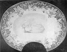 3. Staffordshire shaving basin with a black on white transfer scene and a border of grapes, leaves and geometrical motifs. English, 1840-50. 3. Staffordshire shaving basin with a black on white transfer scene and a border of grapes, leaves and geometrical motifs. English, 1840-50.