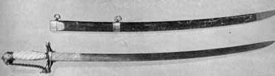 Sword with Scabbard by Samuel Drowne: The silver hilt, that ends in a bird's head, and the mounting bear his mark. It was made circa 1775. The scabbard, as was general at this time, is of finely tanned leather. The blade was probably a European import. Sword with Scabbard by Samuel Drowne: The silver hilt, that ends in a bird's head, and the mounting bear his mark. It was made circa 1775. The scabbard, as was general at this time, is of finely tanned leather. The blade was probably a European import.