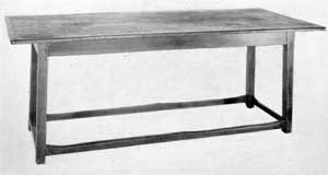 Tavern Table of Birch and Pine: The legs, skirt and strechers are of this hard wood; the top of pine. An early 19th-Century farm piece. It measures seventy-five inches long, thirty-one inches wide and is twenty-eight inches high. Tavern Table of Birch and Pine: The legs, skirt and strechers are of this hard wood; the top of pine. An early 19th-Century farm piece. It measures seventy-five inches long, thirty-one inches wide and is twenty-eight inches high.