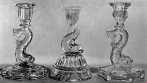 Three Later Dolphin Designs: Left, with circular base; center, a petticoat type from Pittsburgh; and right, with six-sided base. Three Later Dolphin Designs: Left, with circular base; center, a petticoat type from Pittsburgh; and right, with six-sided base.