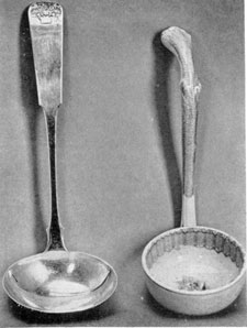 Two Tureen Ladles: At the left: one of silver by J. B. Jones, Boston, Mass., 1782-1854. It bears the basket-of-flowers decoration on the handle and is the type used with many Staffordshire tureens. At the right: a china ladle of the late Staffordshire period, by T. Fell & Co. Two Tureen Ladles: At the left: one of silver by J. B. Jones, Boston, Mass., 1782-1854. It bears the basket-of-flowers decoration on the handle and is the type used with many Staffordshire tureens. At the right: a china ladle of the late Staffordshire period, by T. Fell & Co.