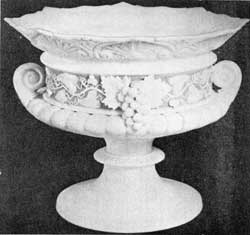 2. One of a pair of classic urn-shaped vase in English Parian ware, c. 1840. The applied relief of grapes and leaves is on a band of blue. 2. One of a pair of classic urn-shaped vase in English Parian ware, c. 1840. The applied relief of grapes and leaves is on a band of blue.