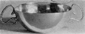 Illustration II: A 17th-Century Dram Cup: Made by John Hull and Robert Sanderson, the Boston silversmiths who became partners in 1652 when the former was appointed mintmaster of the Massachusetts Colony. Hull learned silversmithing in Boston; Sanderson was London trained. Illustration II: A 17th-Century Dram Cup: Made by John Hull and Robert Sanderson, the Boston silversmiths who became partners in 1652 when the former was appointed mintmaster of the Massachusetts Colony. Hull learned silversmithing in Boston; Sanderson was London trained.
