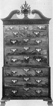 3. Superb cabinetmaking is evident in this chest-on-chest, c. 1775. Note the fine proportions, the carved ornamental pediment and beautiful grain of the mahogany. 3. Superb cabinetmaking is evident in this chest-on-chest, c. 1775. Note the fine proportions, the carved ornamental pediment and beautiful grain of the mahogany.