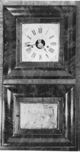 4. A Forestville clock with 1835-39 movement yet uniquely cased in an "OG on an OG" and bearing an exceptional label mentioning only two of the manufacturer's names. 4. A Forestville clock with 1835-39 movement yet uniquely cased in an "OG on an OG" and bearing an exceptional label mentioning only two of the manufacturer's names.