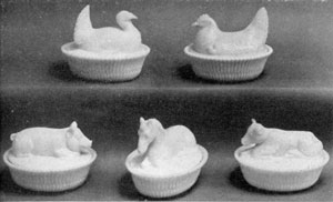 7. "Barnyard" group of opaque white animal-carved dishes, probably made by McKee Brothers of Pittsburgh, Pennsylvania. 7. "Barnyard" group of opaque white animal-carved dishes, probably made by McKee Brothers of Pittsburgh, Pennsylvania.