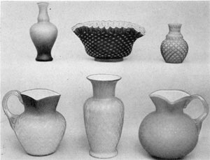 9. Group of Satin glass illustrating the many patterns and colors obtainable by using varied colors and platings. Vase at upper left shades from blue to pink; the bowl next to it is purple; the small vase, pink. The lower left pitcher shades from white to deep rose; the vase next it, ivory to pink; the right-hand pitcher is deep blue. 9. Group of Satin glass illustrating the many patterns and colors obtainable by using varied colors and platings. Vase at upper left shades from blue to pink; the bowl next to it is purple; the small vase, pink. The lower left pitcher shades from white to deep rose; the vase next it, ivory to pink; the right-hand pitcher is deep blue.