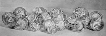 A Group of Antique Glass Marbles: Some have swirled centers. All are presumably of European make and are average quality. A Group of Antique Glass Marbles: Some have swirled centers. All are presumably of European make and are average quality.