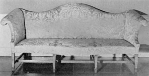 An American Chippendale Sofa: Probably made in Philadelphia, the tapered legs with spade feet have unusual lines of inlay. This piece was formerly owned by the Rutgers family, New Brunswick, New Jersey. An American Chippendale Sofa: Probably made in Philadelphia, the tapered legs with spade feet have unusual lines of inlay. This piece was formerly owned by the Rutgers family, New Brunswick, New Jersey.