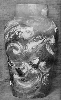 Illustration II: Another Early Rookwood Vase: Signed by the maker, Valentine, and bearing the date 1883, it is typical of the experimental stage of this pattern. The artist who made it later became one of the finest artists who worked at Rookwood. Illustration II: Another Early Rookwood Vase: Signed by the maker, Valentine, and bearing the date 1883, it is typical of the experimental stage of this pattern. The artist who made it later became one of the finest artists who worked at Rookwood.