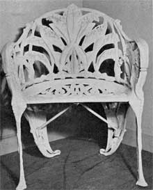 Armchair in Lily-of-the-Valley Design: Both the broad leaves and stems of blossom of this plant were used as motifs through the design of this chair. Armchair in Lily-of-the-Valley Design: Both the broad leaves and stems of blossom of this plant were used as motifs through the design of this chair.