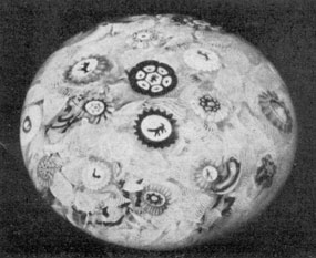Baccarat, Marked B, 1848: In this the millefiori canes, some of animals, birds, or butterflies rest on duplicate white lacelike background. Baccarat, Marked B, 1848: In this the millefiori canes, some of animals, birds, or butterflies rest on duplicate white lacelike background.