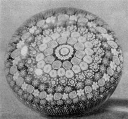 A Clichy Design in Millefiori: For its mark this factory used rose canes, a central one with a capital C and, infrequently, the entire name Clichy in such paperweights. A Clichy Design in Millefiori: For its mark this factory used rose canes, a central one with a capital C and, infrequently, the entire name Clichy in such paperweights.