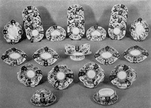 A Crown Derby Dessert Service: The decoration is in the Imari style. The panels are underglaze, done in blue, ferro-red, green, light blue, gold, and other colors. This service was made circa 1800. A Crown Derby Dessert Service: The decoration is in the Imari style. The panels are underglaze, done in blue, ferro-red, green, light blue, gold, and other colors. This service was made circa 1800.