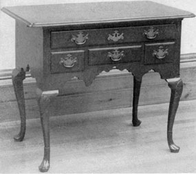 An Early Chippendale Lowboy: While often made to match a highboy, lowboys were largely used as dressing tables. The size and number of drawers made such pieces most convenient for this use. An Early Chippendale Lowboy: While often made to match a highboy, lowboys were largely used as dressing tables. The size and number of drawers made such pieces most convenient for this use.