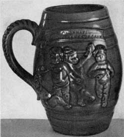 3. Early example (1882) of Mrs. Storer's Rookwood pottery—blue-glazed earthenware mug bearing a design of infants at play. 3. Early example (1882) of Mrs. Storer's Rookwood pottery—blue-glazed earthenware mug bearing a design of infants at play.