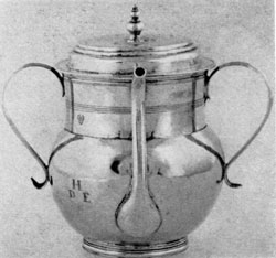 Illustration I: Early Spout Cup: By Jeremiah Dummer, Boston, 1645-1718, this piece with two handles, nicely curved, spout and lid with finial is characteristic of the simplicity of 17th-Century American silver. Illustration I: Early Spout Cup: By Jeremiah Dummer, Boston, 1645-1718, this piece with two handles, nicely curved, spout and lid with finial is characteristic of the simplicity of 17th-Century American silver.