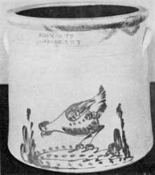 An Unusual Stone Crock: Made by Adam Caire of Poughkeepsie, New York, in the last quarter of the 19th Century. Its distinctive feature is the decoration in cobalt blue of a chicken pecking at corn. An Unusual Stone Crock: Made by Adam Caire of Poughkeepsie, New York, in the last quarter of the 19th Century. Its distinctive feature is the decoration in cobalt blue of a chicken pecking at corn.