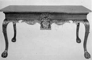 An English Mahogany Side Table: Made in London, 1745-1750, the apron has boldly carved acanthus foliage and scrolls. The feet are of the lion paw design. Formerly in the collection of Lord Lamborne, P.C., G.C.V.O. of Bishop's Hall, Lamborne. An English Mahogany Side Table: Made in London, 1745-1750, the apron has boldly carved acanthus foliage and scrolls. The feet are of the lion paw design. Formerly in the collection of Lord Lamborne, P.C., G.C.V.O. of Bishop's Hall, Lamborne.