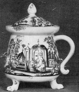 Illustration VIII: By An Unknown Artist: This round vessel on three paw feet with cover and handle has a Chinoisserie decoration in iron red probably done at Meissen early in the 18th Century. Illustration VIII: By An Unknown Artist: This round vessel on three paw feet with cover and handle has a Chinoisserie decoration in iron red probably done at Meissen early in the 18th Century.